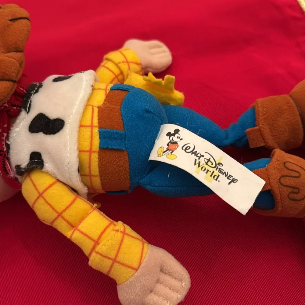 Woody Toy Story 11” red bandana, yellow sheriff’s star. Walt Disney World (OLCC)